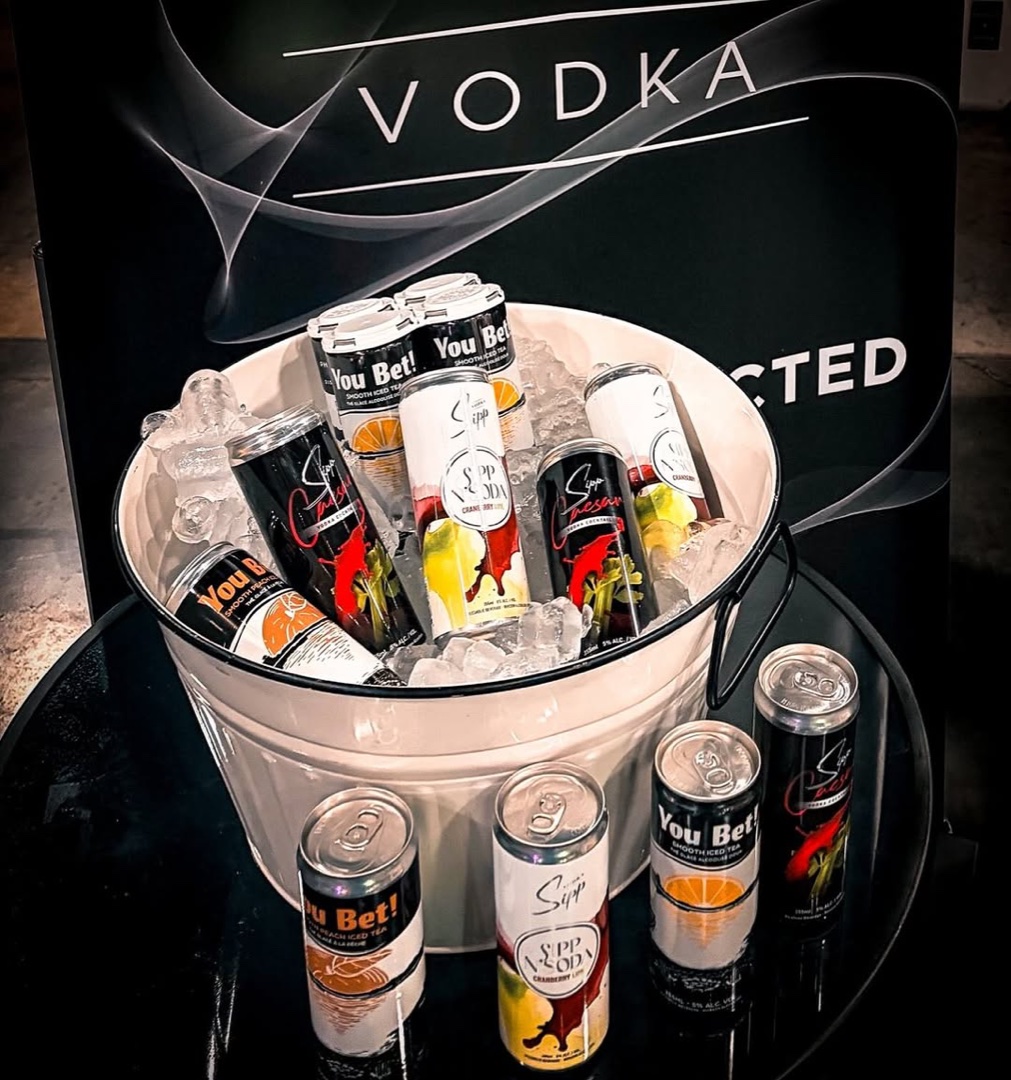 Bucket of mixed Sipp N'Soda, Caesar, and You Bet cans on ice