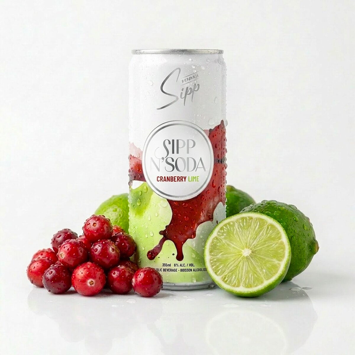 Sipp N'Soda Cranberry Lime can with cranberries and lime